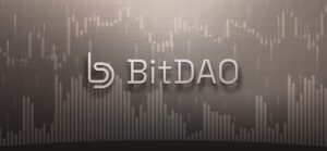 The word BitDAO against a wall with a graph