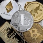 metallic representations of various cryptocurrencies, including Bitcoin, Ethereum, Litecoin, and Ripple